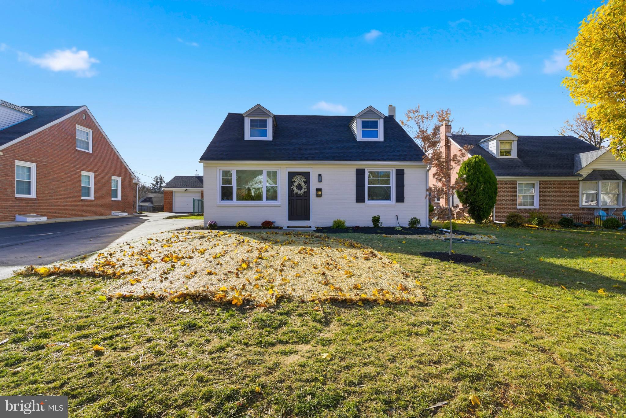 338 Wayne Avenue Springfield, PA 19064 - Photo 1 of 34 a front view of a house with a yard
