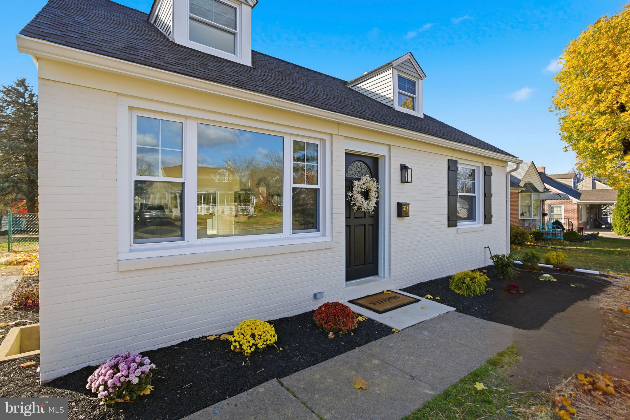 338 Wayne Avenue Springfield, PA 19064 - Photo 3 of 34 a front view of a house with a yard