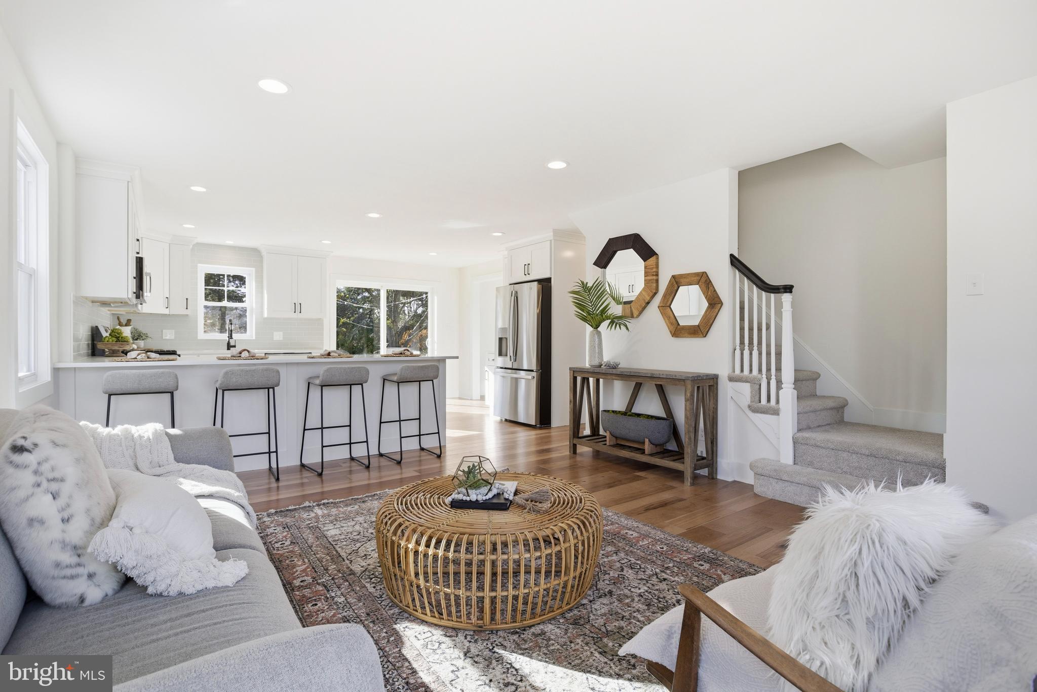338 Wayne Avenue Springfield, PA 19064 - Photo 5 of 34 a living room with furniture a rug and white walls