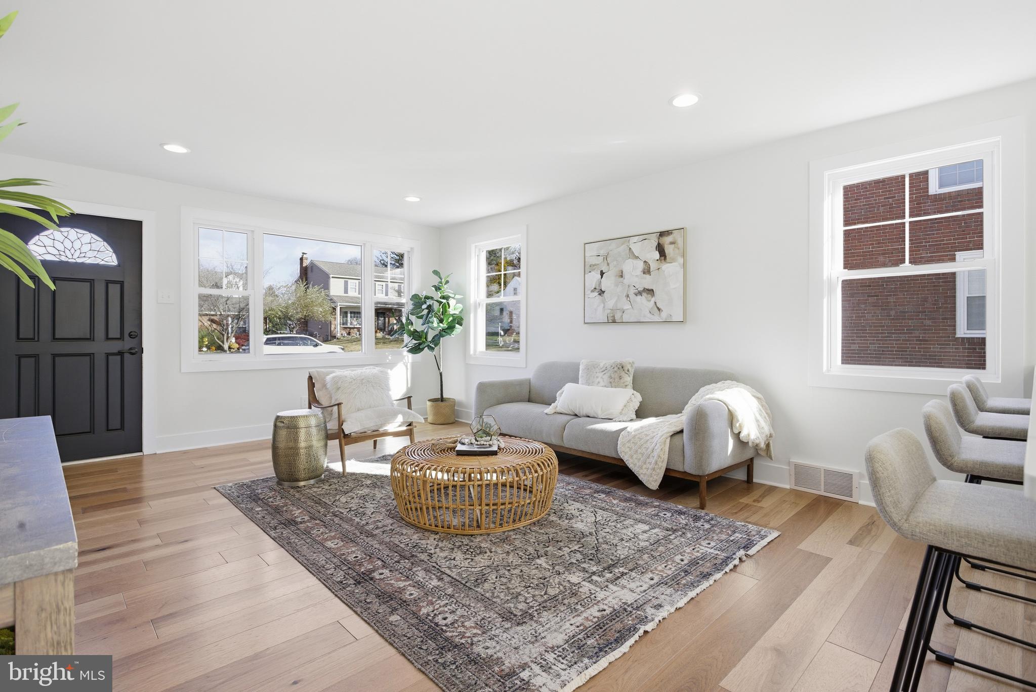 338 Wayne Avenue Springfield, PA 19064 - Photo 6 of 34 a living room with furniture and wooden floor