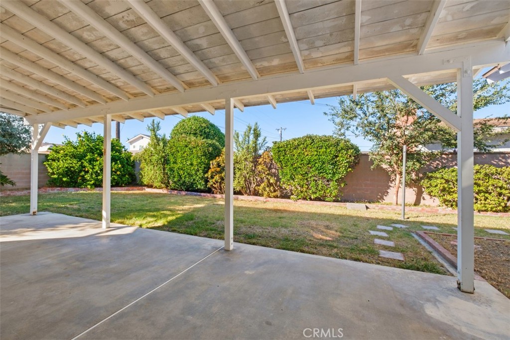 10221 Macduff Street Stanton, CA 90680 - Photo 24 of 31 a view of a porch with yard