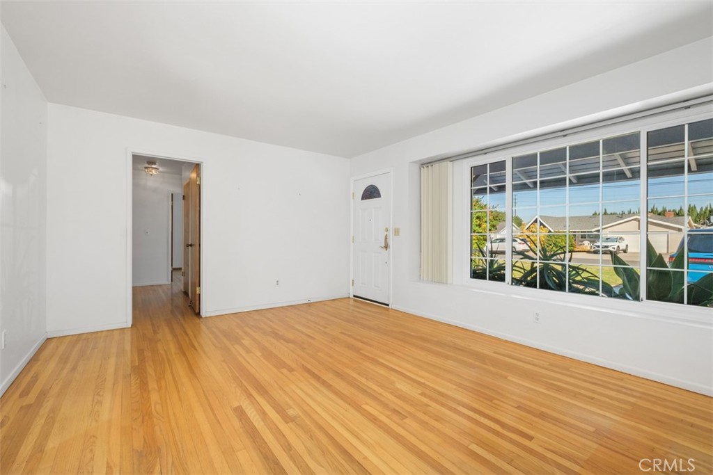 10221 Macduff Street Stanton, CA 90680 - Photo 7 of 31 a view of an empty room with a window