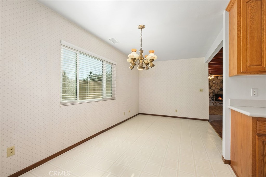 10221 Macduff Street Stanton, CA 90680 - Photo 9 of 31 a view of an empty room with a window
