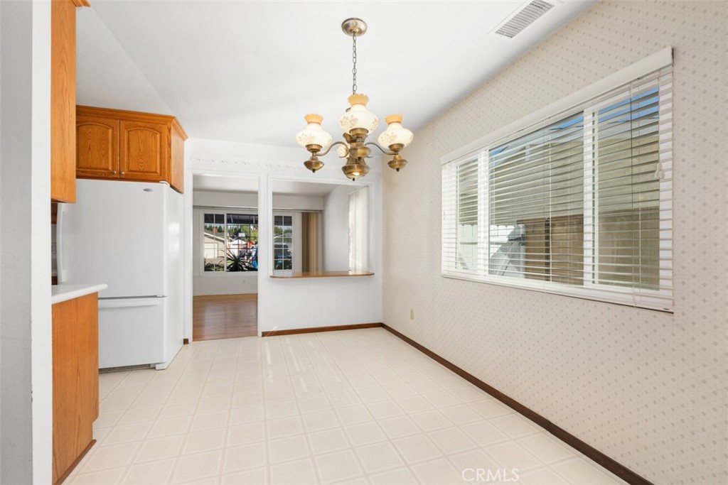 10221 Macduff Street Stanton, CA 90680 - Photo 10 of 31 a view of livingroom with chandelier