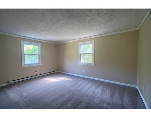 83 Lincoln Road Sutton, MA 01590 - Photo 11 of 22 a view of an empty room with a window