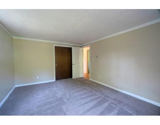 83 Lincoln Road Sutton, MA 01590 - Photo 13 of 22 a view of an empty room and window