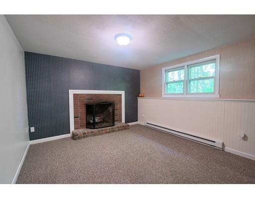 83 Lincoln Road Sutton, MA 01590 - Photo 14 of 22 a view of an empty room with a window