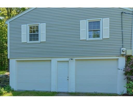 83 Lincoln Road Sutton, MA 01590 - Photo 20 of 22 a view of front of house with a large window