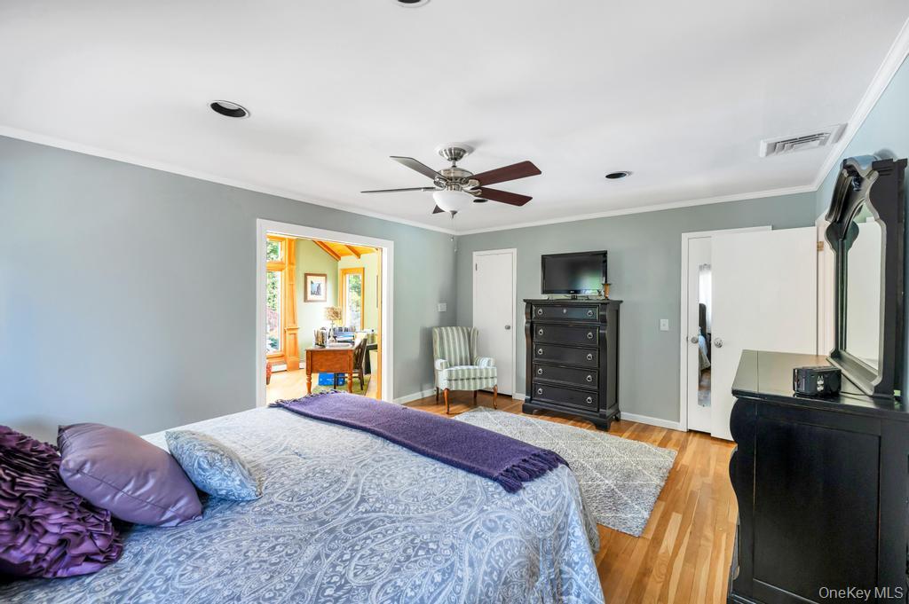 10 South Lot Road Smithtown, NY 11787 - Photo 24 of 50 Hardwood flooring throughout, recessed lighting, and a ceiling fan
