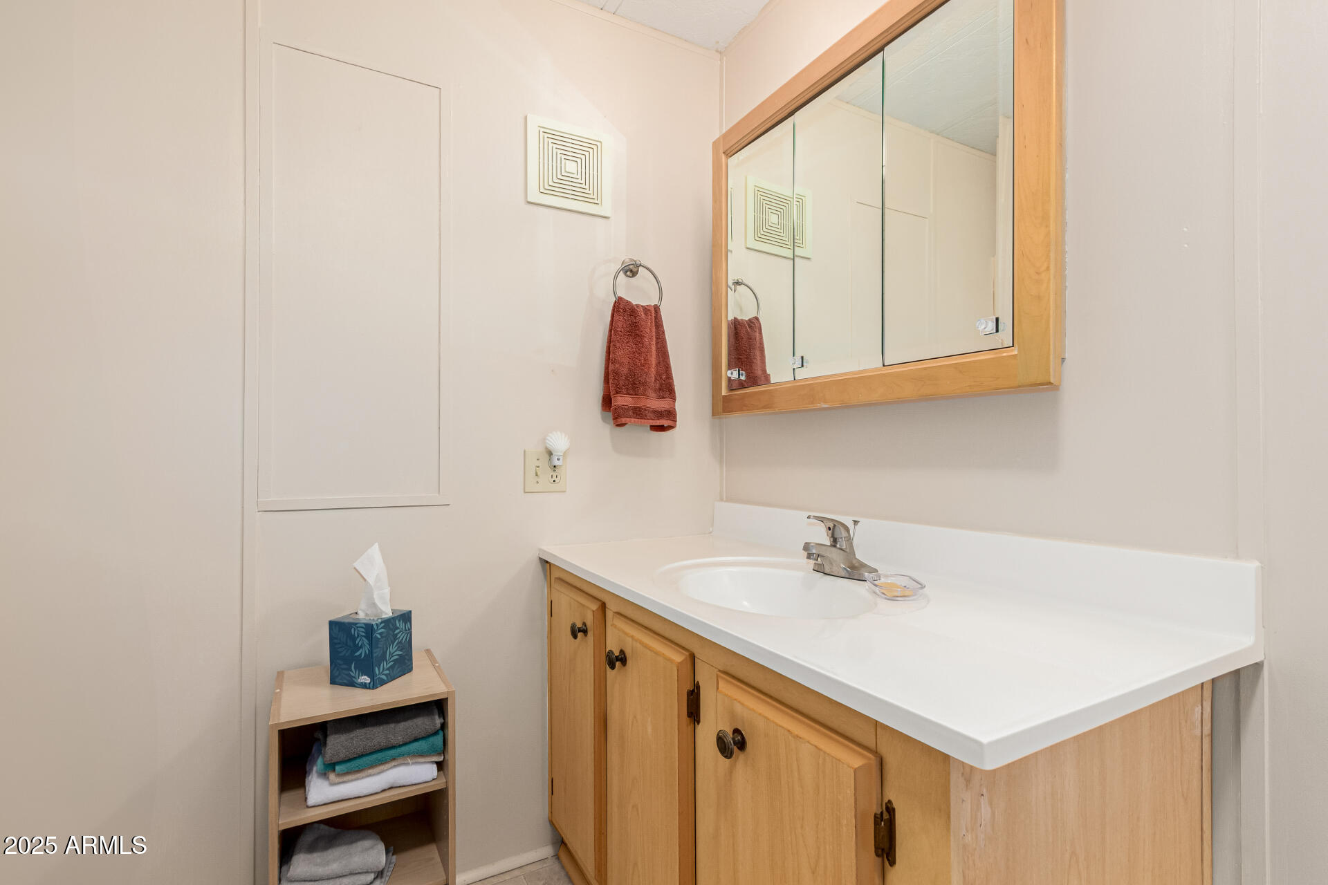 53 North Mountain Road, Unit 19 Apache Junction, AZ 85120 - Photo 16 of 21 a bathroom with a sink and a mirror