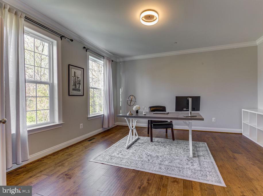 600 Ray Road Sunderland, MD 20689 - Photo 11 of 25 a view of a workspace with wooden floor and a window