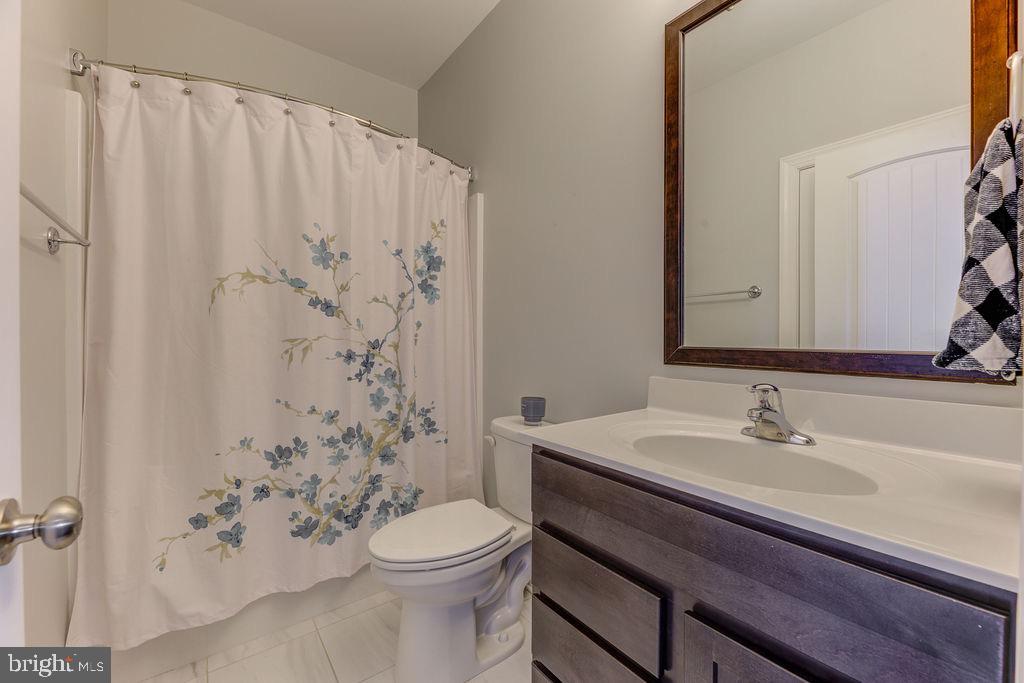 600 Ray Road Sunderland, MD 20689 - Photo 12 of 25 a bathroom with a sink toilet and shower