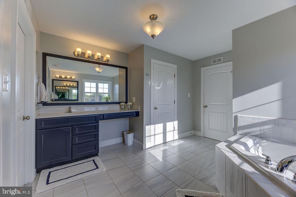 600 Ray Road Sunderland, MD 20689 - Photo 16 of 25 a kitchen with a sink and a refrigerator