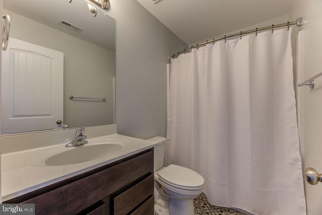 600 Ray Road Sunderland, MD 20689 - Photo 17 of 25 a bathroom with a sink and a mirror