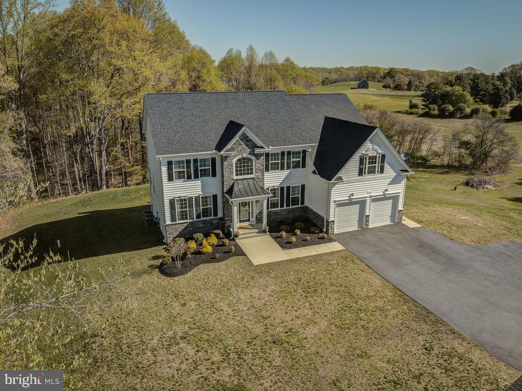 600 Ray Road Sunderland, MD 20689 - Photo 25 of 25 a view of a house with backyard porch and sitting area