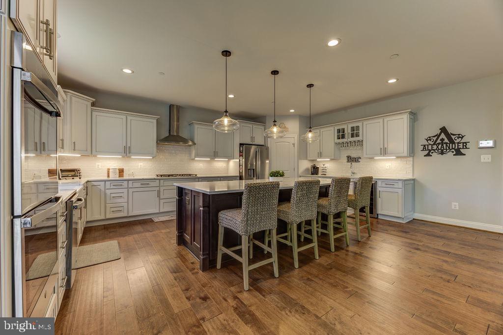 600 Ray Road Sunderland, MD 20689 - Photo 3 of 25 a large kitchen with lots of counter space a sink and appliances