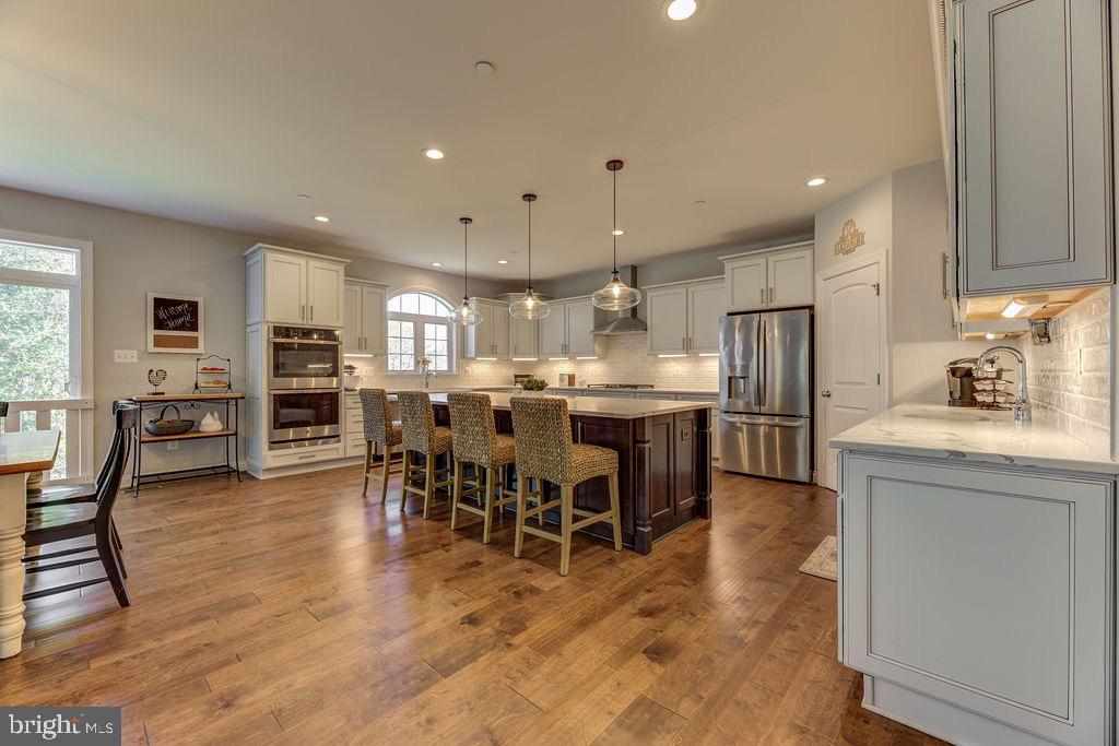 600 Ray Road Sunderland, MD 20689 - Photo 4 of 25 a kitchen with lots of counter top space and stainless steel appliances