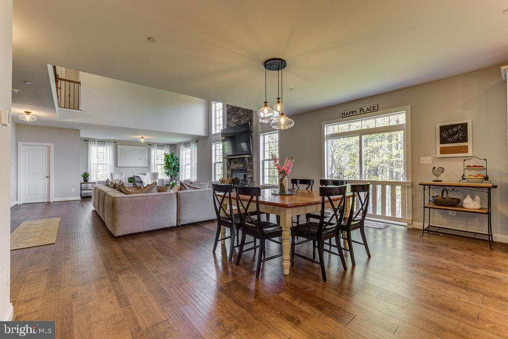 600 Ray Road Sunderland, MD 20689 - Photo 5 of 25 a view of a dining room with furniture window and wooden floor