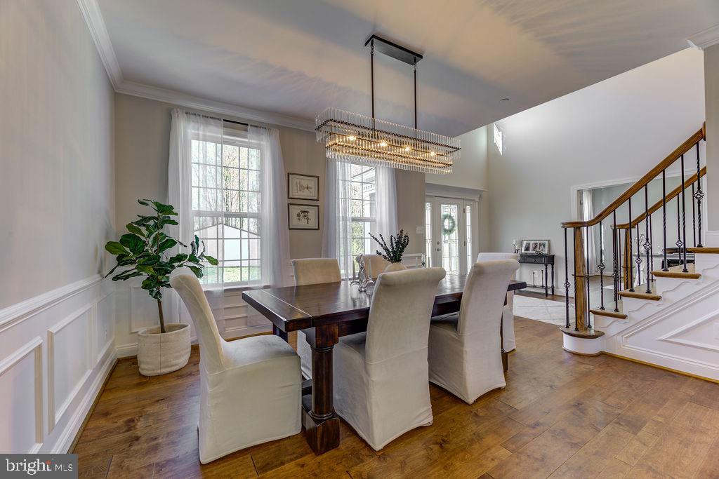 600 Ray Road Sunderland, MD 20689 - Photo 10 of 25 a view of a dining room with furniture window and wooden floor