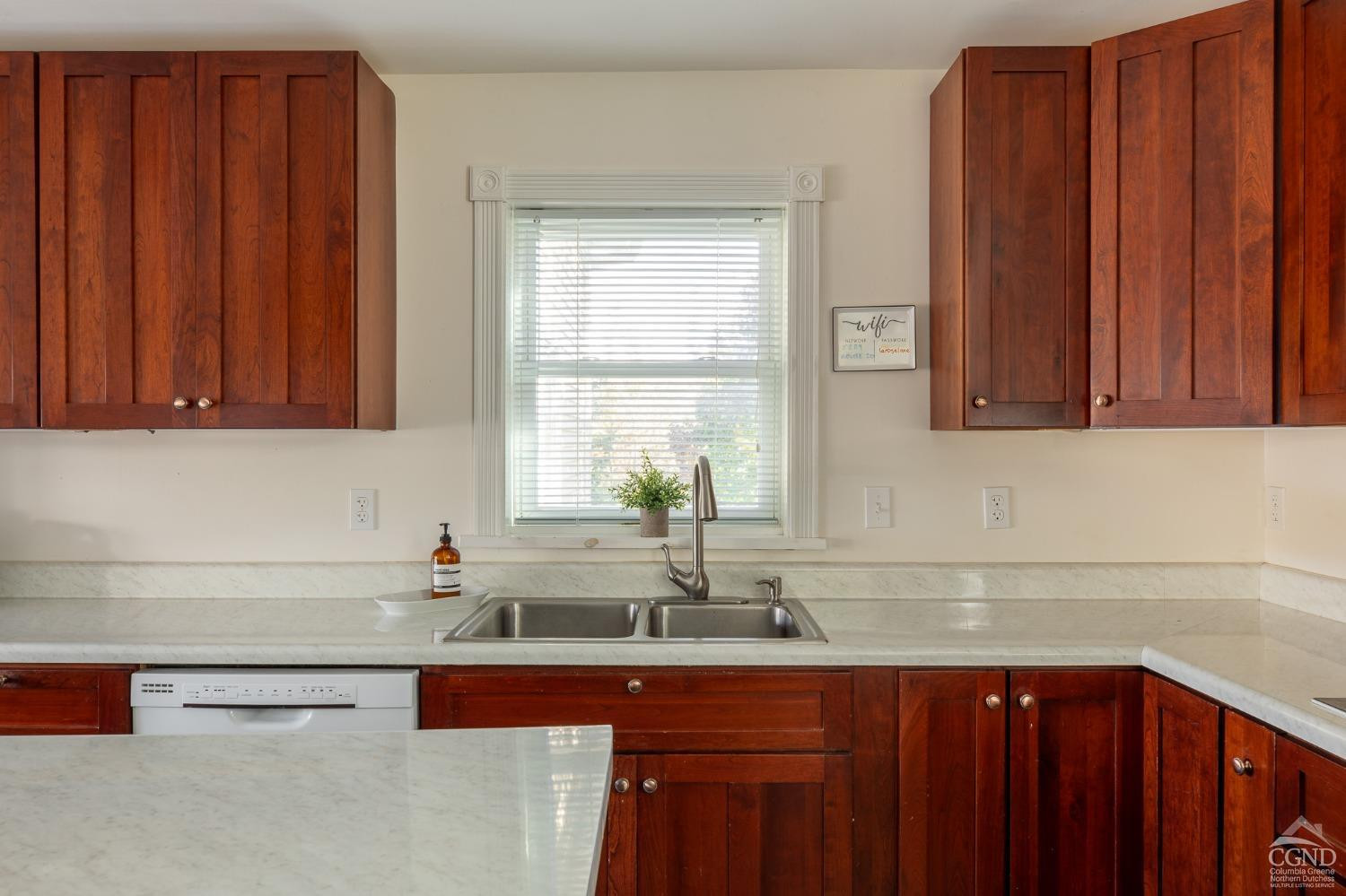 5289 Co Rte 20 Durham, NY 12422 - Photo 23 of 59 a kitchen with stainless steel appliances granite countertop wooden cabinets a sink and dishwasher
