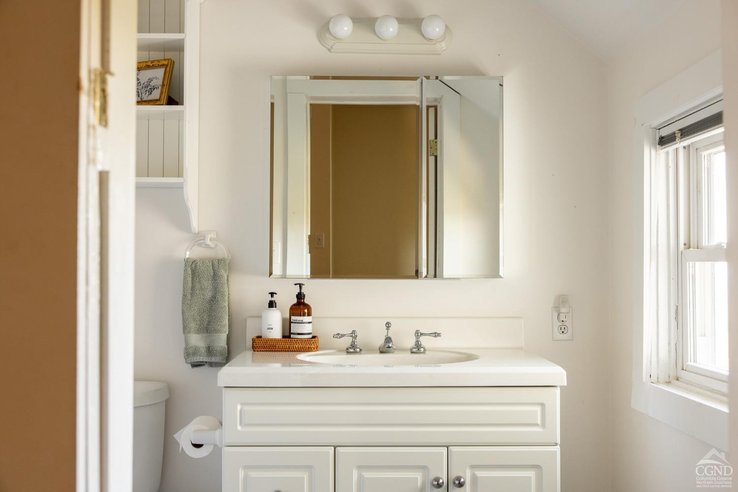 5289 Co Rte 20 Durham, NY 12422 - Photo 30 of 59 a bathroom with a sink vanity and a mirror