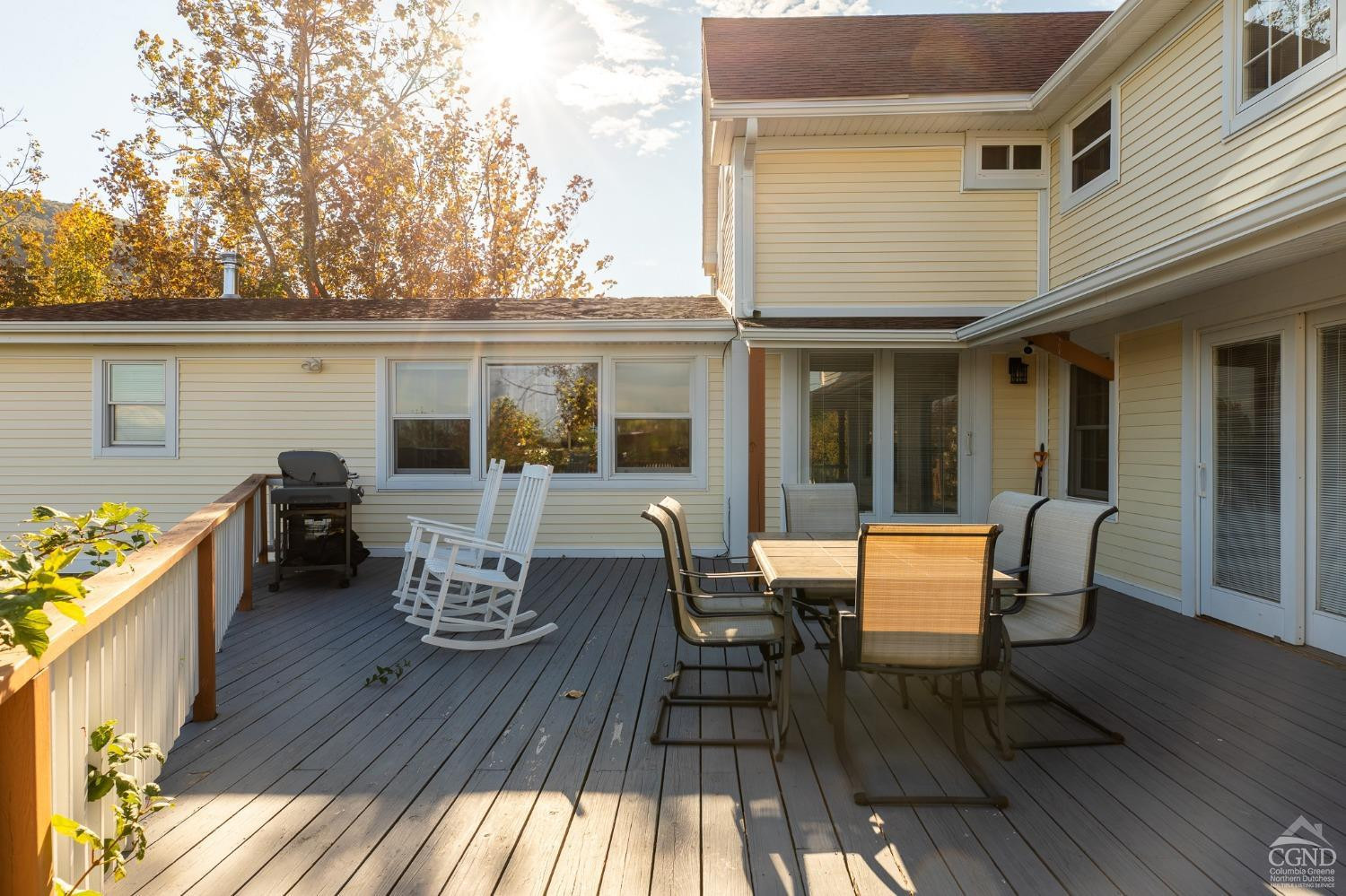 5289 Co Rte 20 Durham, NY 12422 - Photo 43 of 59 a view of a patio with table and chairs and wooden floor