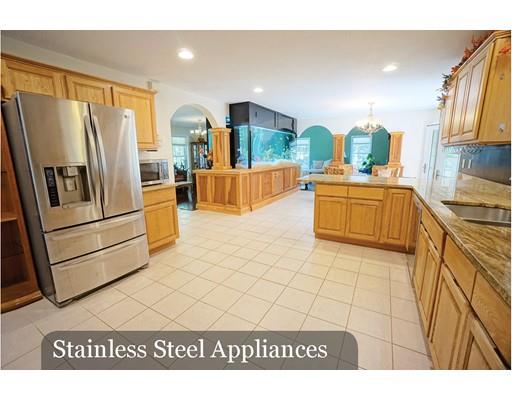 93 Patten Hill Road Candia, NH 03034 - Photo 16 of 40 a kitchen with stainless steel appliances a refrigerator sink and stove
