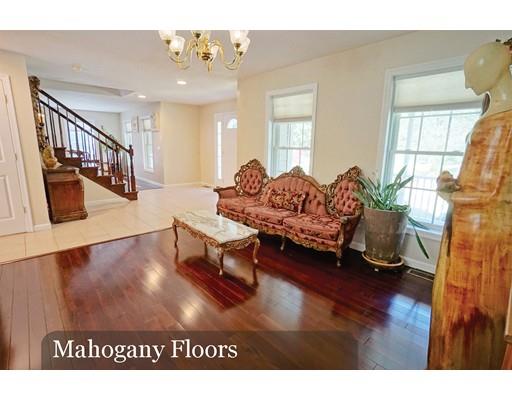 93 Patten Hill Road Candia, NH 03034 - Photo 10 of 40 a living room with furniture and a wooden floor