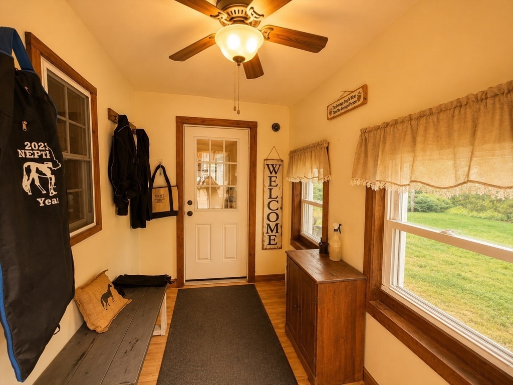 271 Lower Road Deerfield, MA 01342 - Photo 13 of 40 a view of walk in closet with clothes and shoes