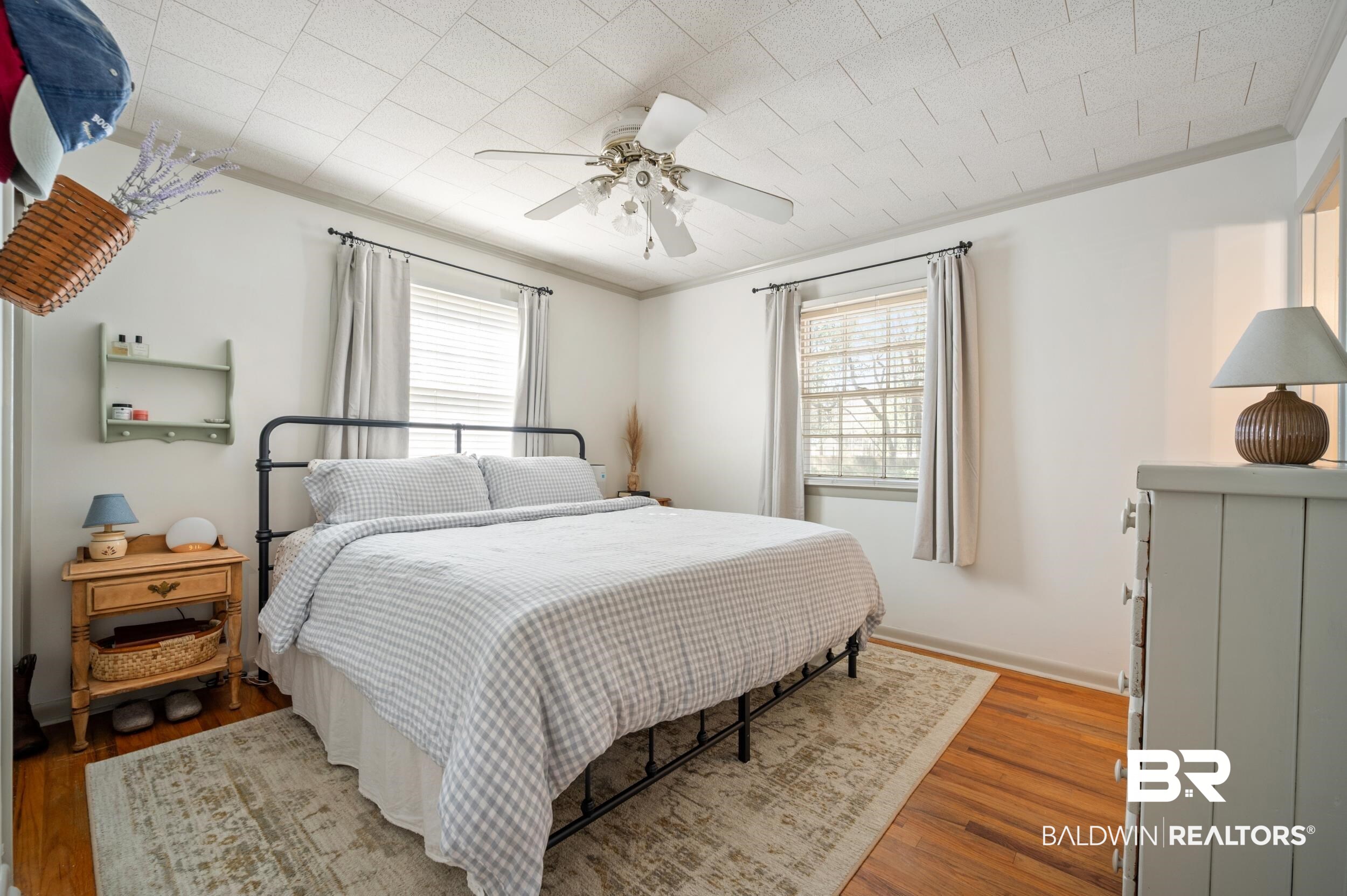 809 Moog Avenue Bay Minette, AL 36507 - Photo 22 of 33 Bedroom featuring wood finished floors, ceiling fan, and ornamental molding