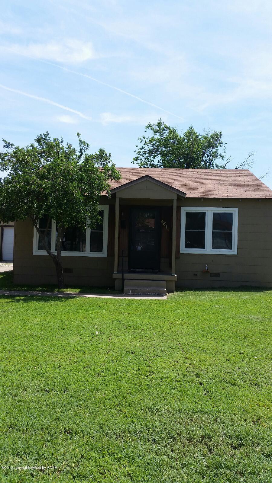 4619 Preston Street Amarillo, TX 79110 - Photo 1 of 3 a front view of a house with a yard