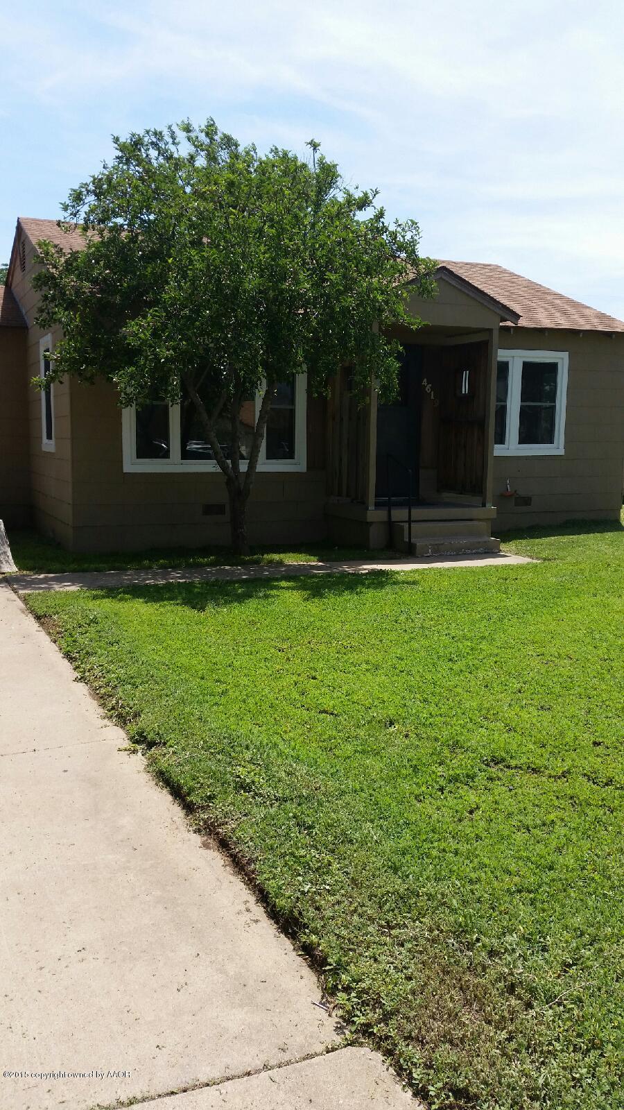 4619 Preston Street Amarillo, TX 79110 - Photo 3 of 3 a front view of a house with a garden and trees