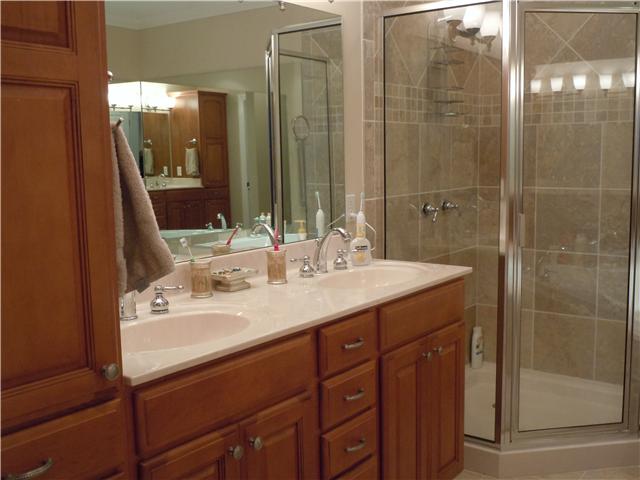 7100 Dale Ridge Road, Unit J4 Lancaster, TN 38569 - Photo 14 of 20 Master Bath suite has raised counters, double vanities, and a glass shower