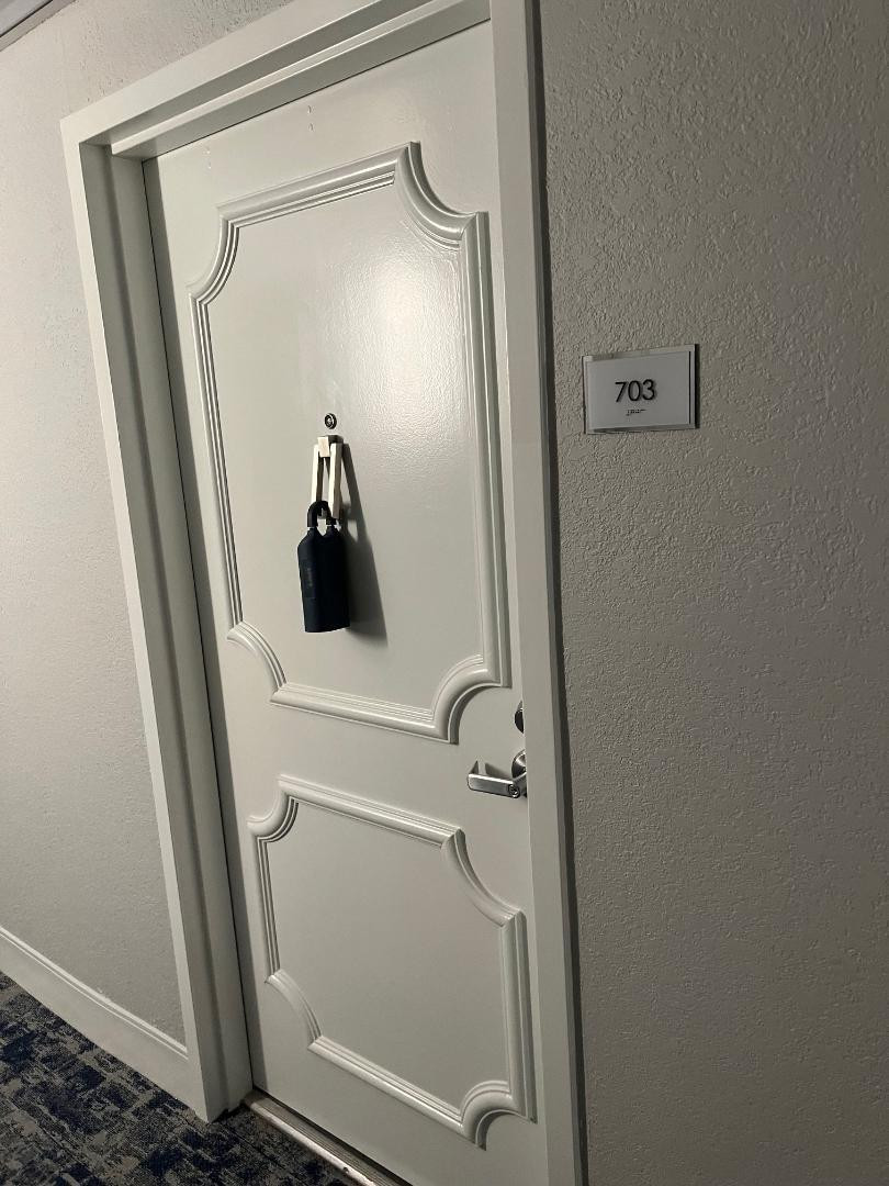 899 Jeffery Street, Unit 703 Boca Raton, FL 33487 - Photo 18 of 22 a bathroom with a sink and mirror