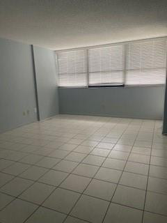 899 Jeffery Street, Unit 703 Boca Raton, FL 33487 - Photo 20 of 22 an empty room with a window