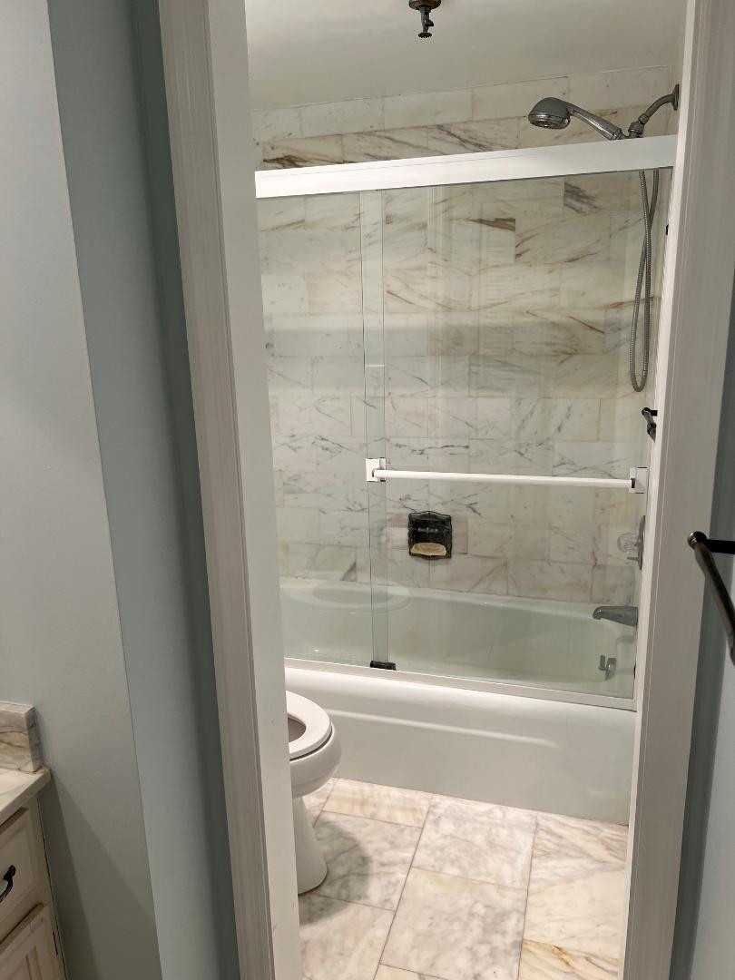 899 Jeffery Street, Unit 703 Boca Raton, FL 33487 - Photo 8 of 22 a bathroom with a shower