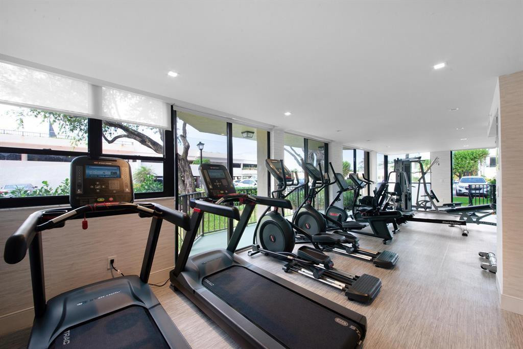899 Jeffery Street, Unit 703 Boca Raton, FL 33487 - Photo 10 of 22 a view of a room with gym equipment