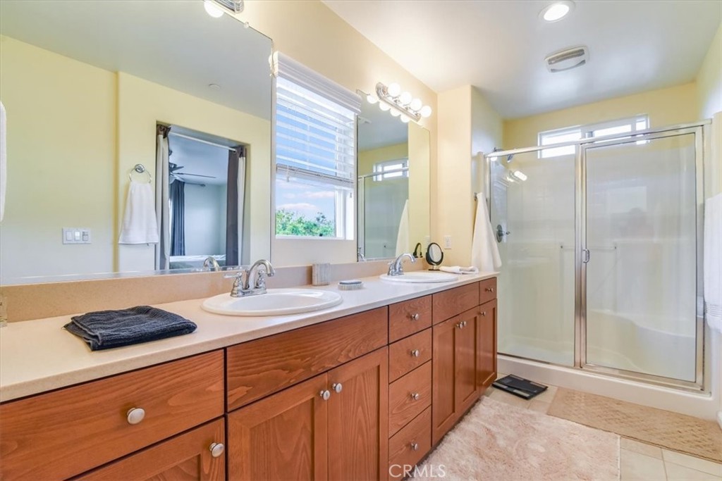 1213 Meridian Way Lompoc, CA 93436 - Photo 23 of 37 a bath room with a sink and a mirror
