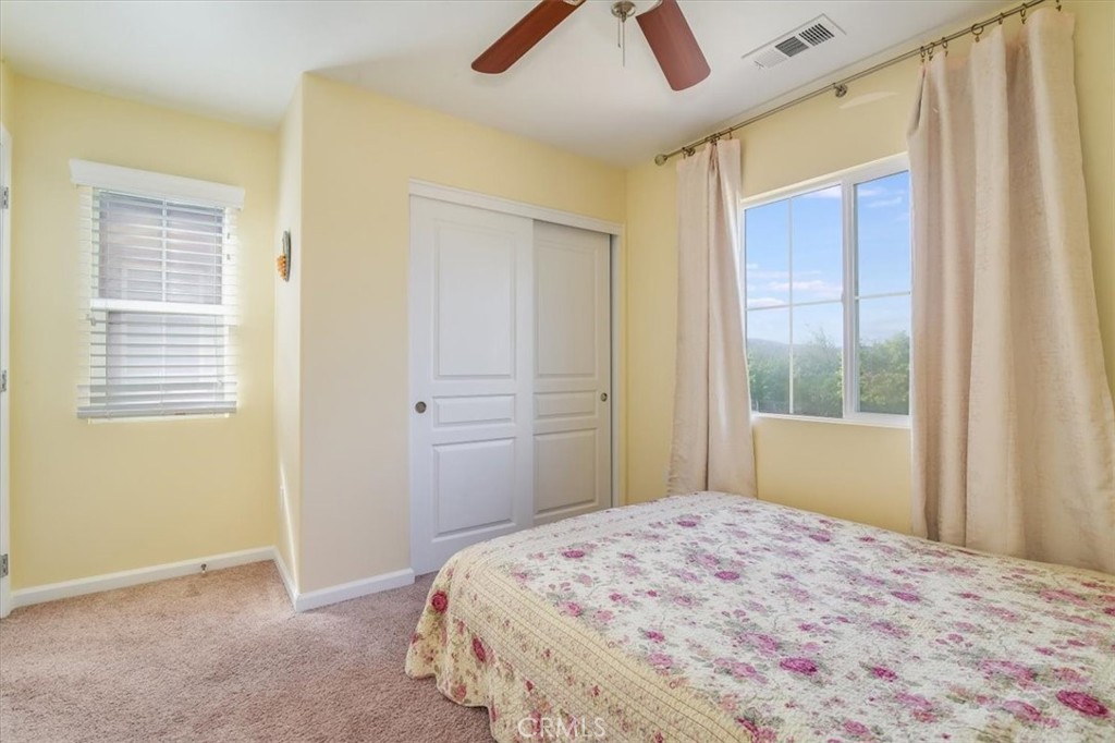 1213 Meridian Way Lompoc, CA 93436 - Photo 26 of 37 a bedroom with a bed and a window