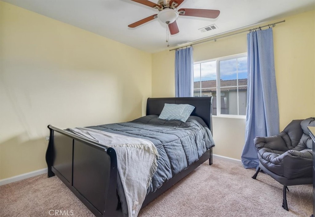 1213 Meridian Way Lompoc, CA 93436 - Photo 27 of 37 a bedroom with a bed and window