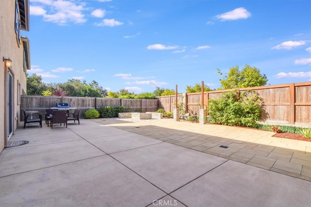 1213 Meridian Way Lompoc, CA 93436 - Photo 29 of 37 a view of backyard with outdoor seating and plants