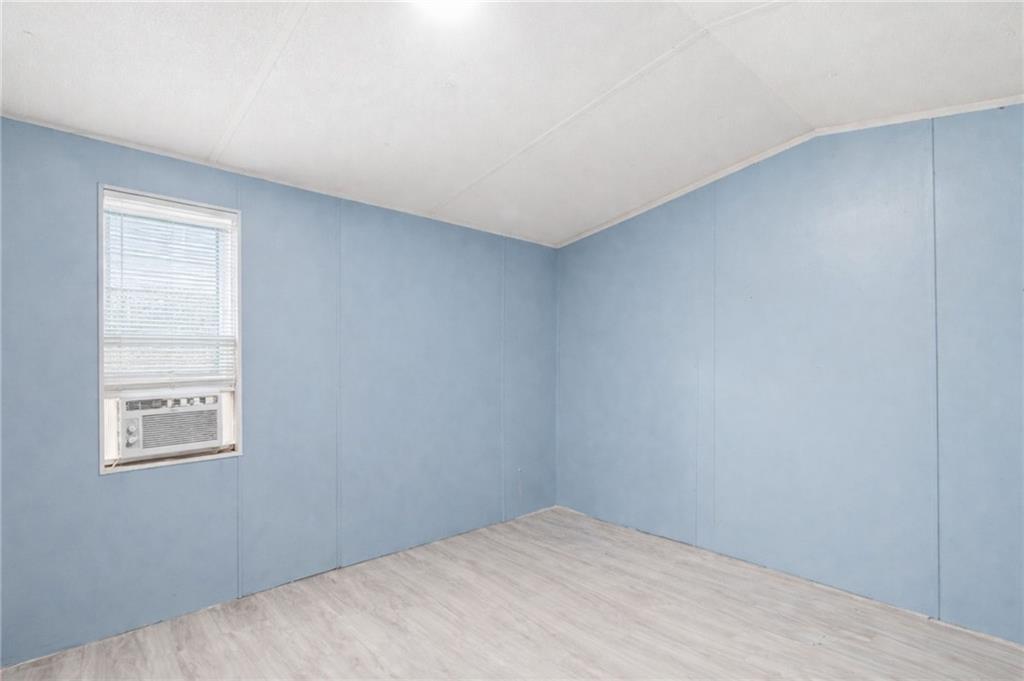 1344 Brookhaven Lane Blue Ridge, GA 30513 - Photo 9 of 17 a view of an empty room with a window