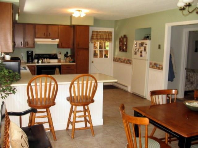78 Albion Road Waterville, ME 04901 - Photo 5 of 17 Kitchen and dining area