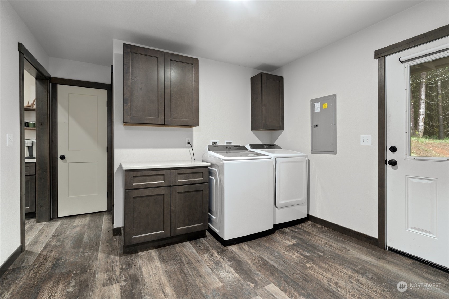 161 Spooner Road Chehalis, WA 98532 - Photo 35 of 39 a room with a stove and wooden cabinets
