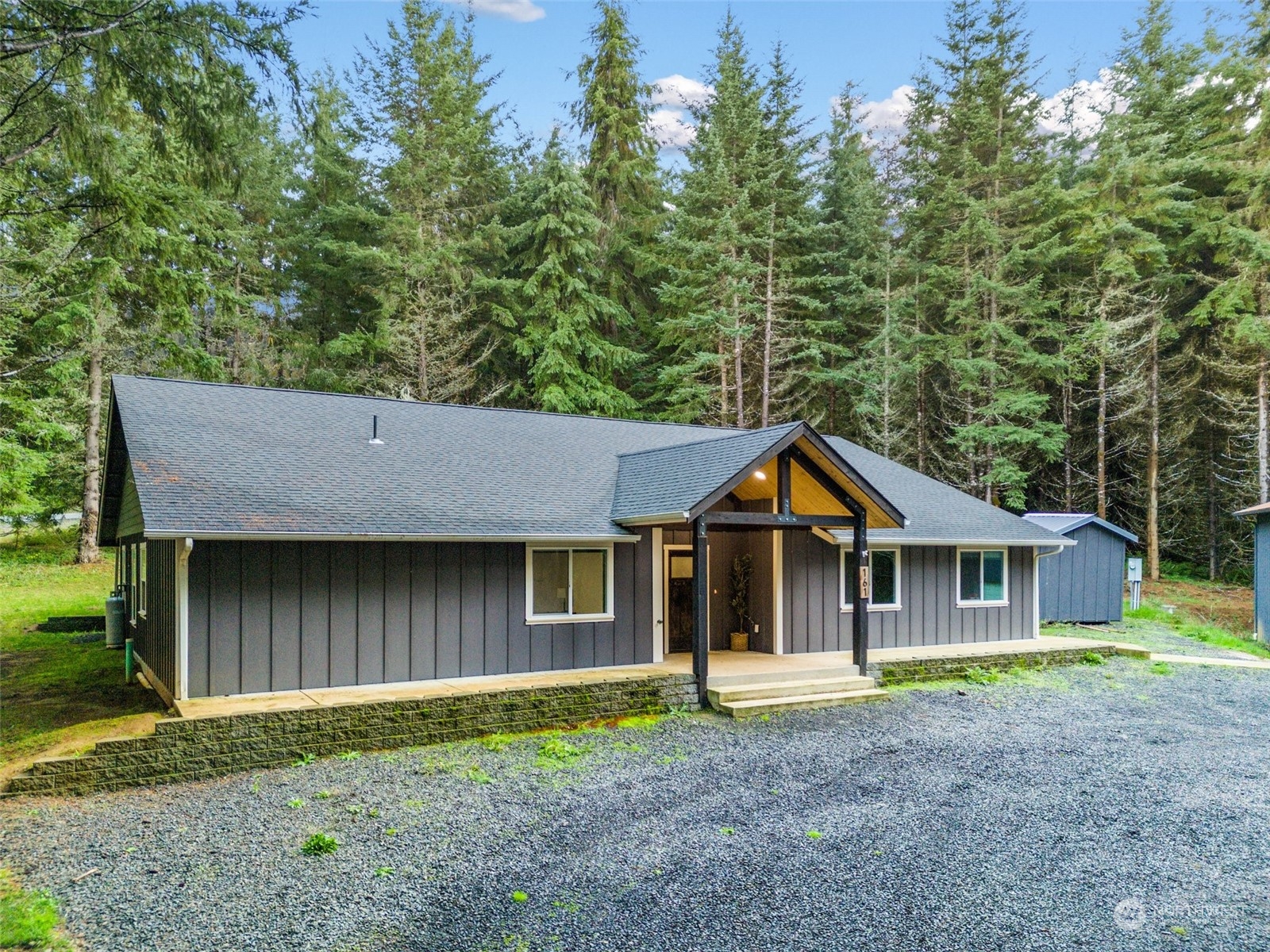 161 Spooner Road Chehalis, WA 98532 - Photo 6 of 39 a front view of a house with a garden