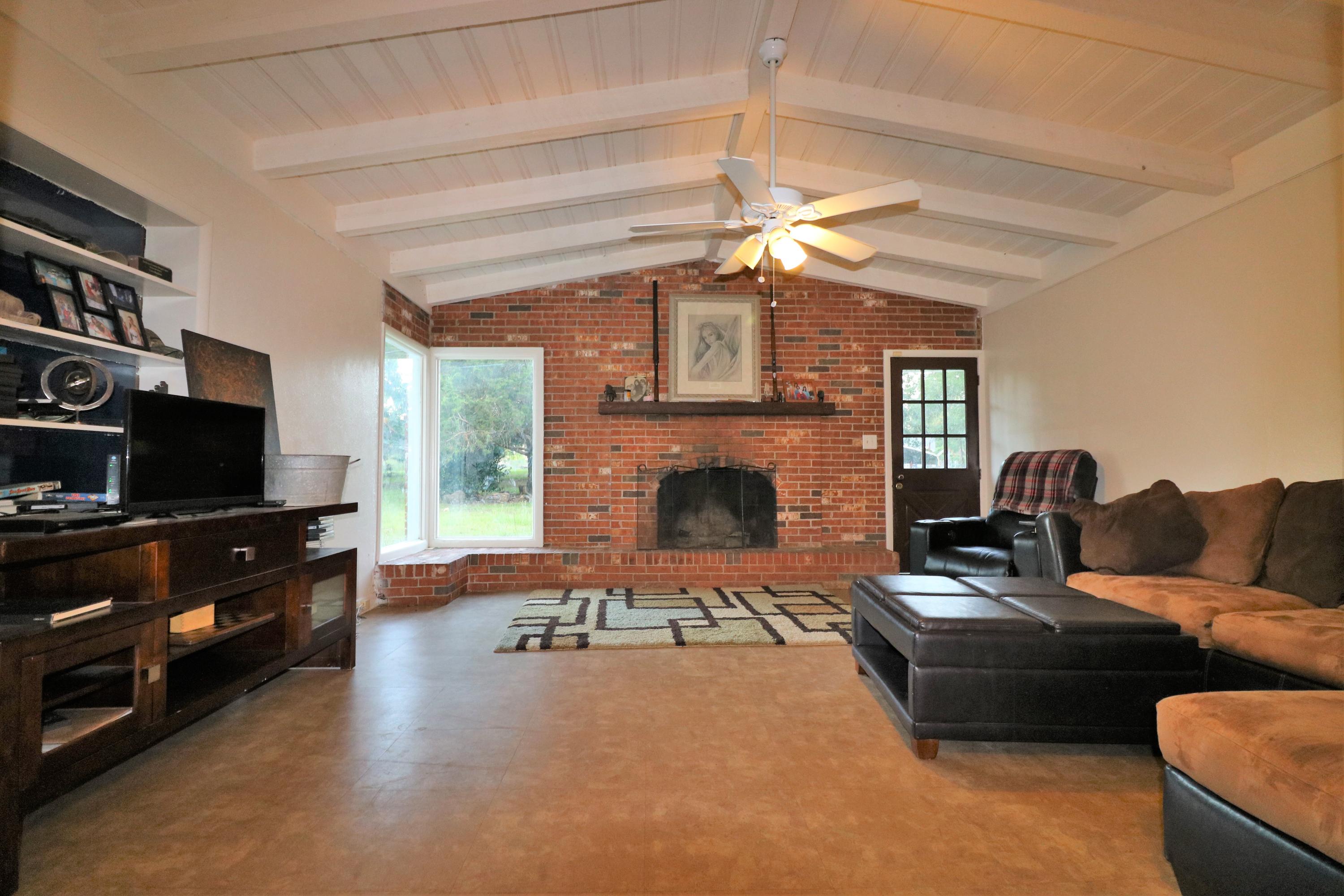 3448 Spool Mill Road Vernon, FL 32462 - Photo 7 of 22 Living room with fireplace