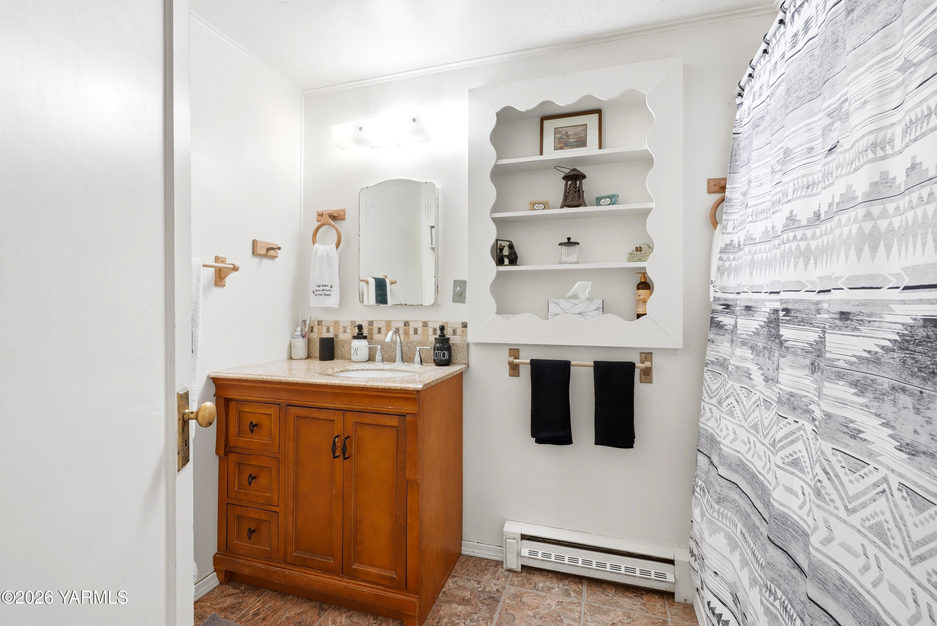 690 North Gleed Road Naches, WA 98937 - Photo 24 of 60 a spacious bathroom with a sink and a mirror