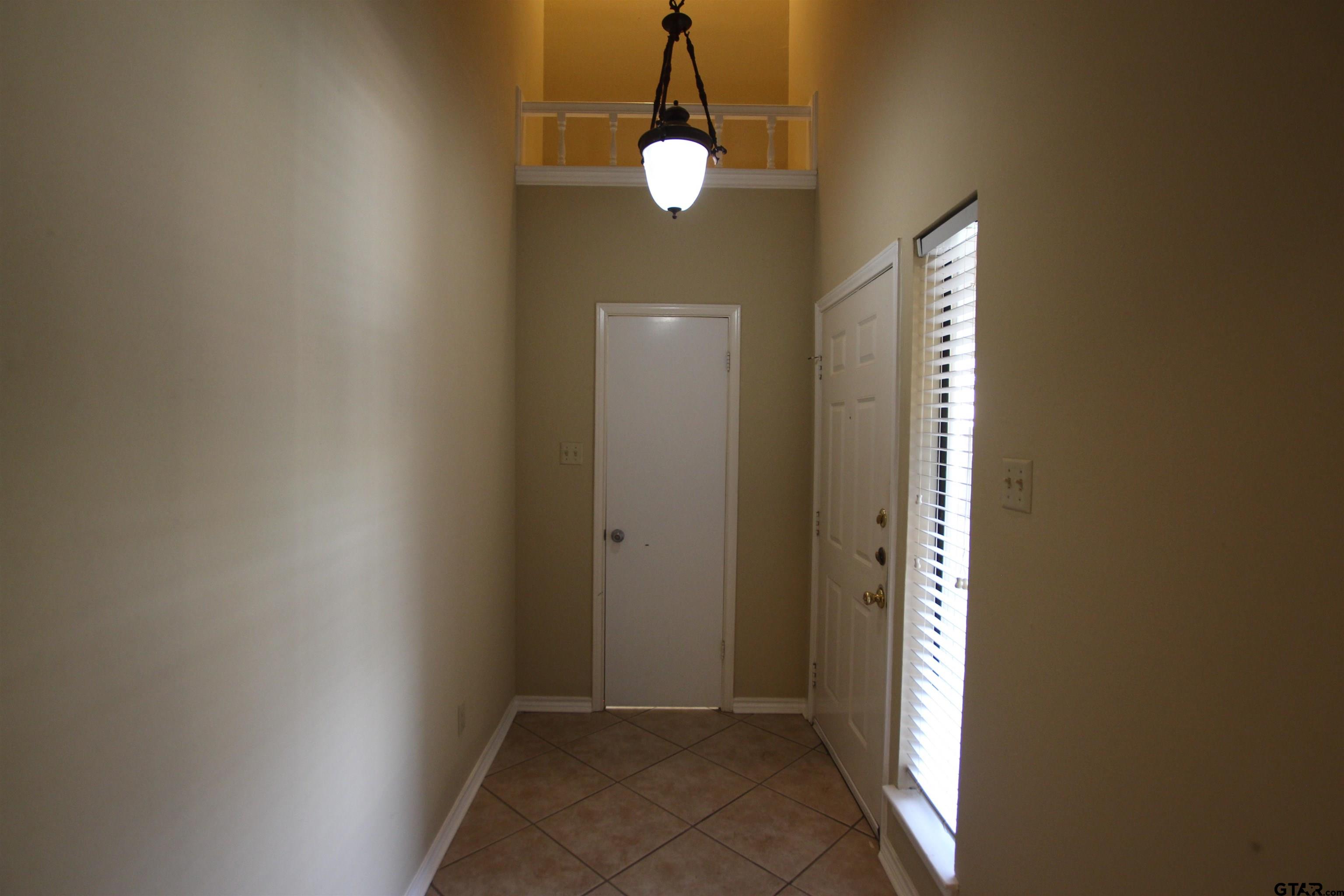 5875 Creekside Circle Tyler, TX 75703 - Photo 3 of 32 a view of a livingroom and window