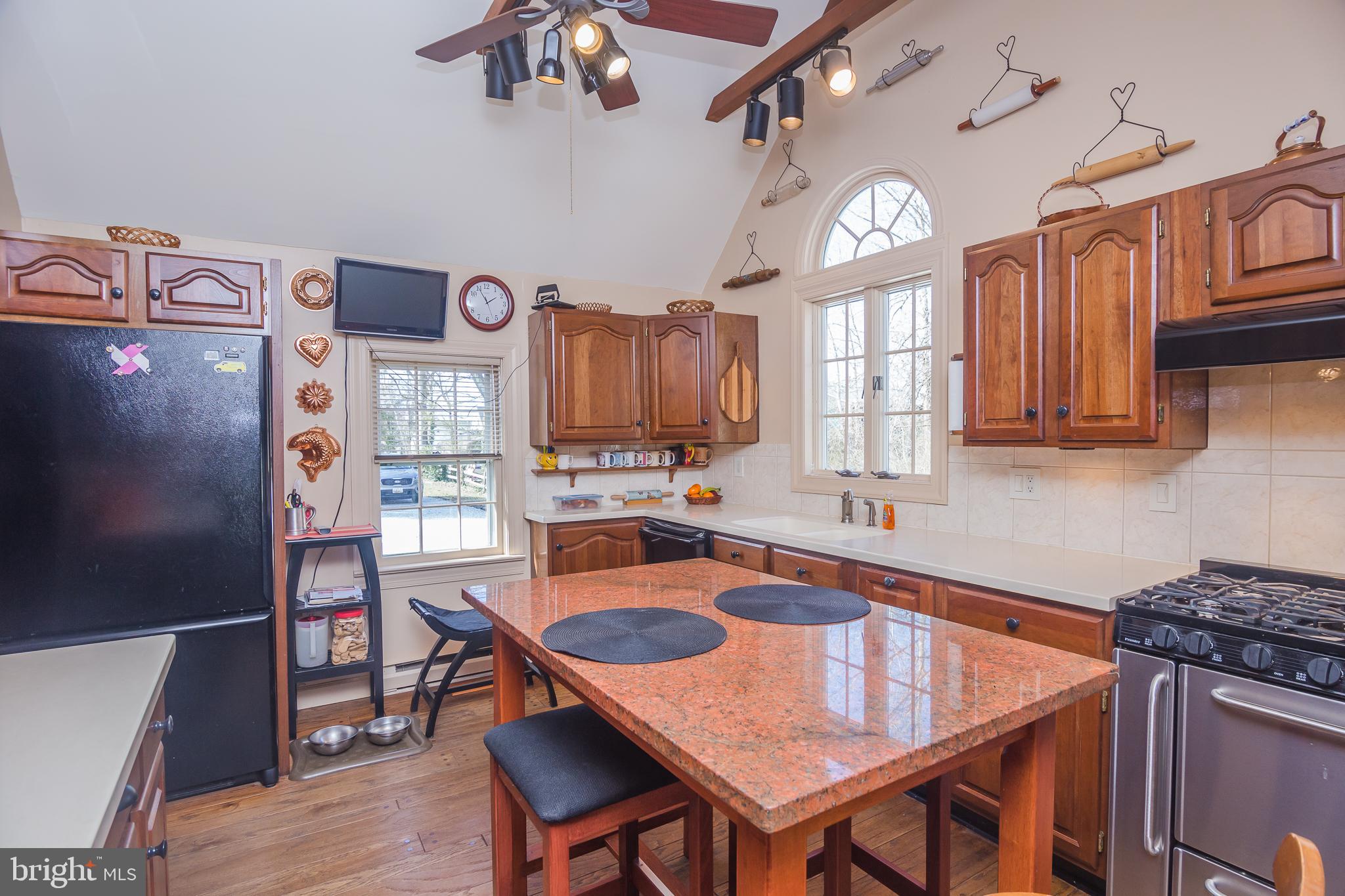 3387 Allen Road Eden, MD 21822 - Photo 22 of 67 a kitchen with granite countertop a sink appliances and cabinets