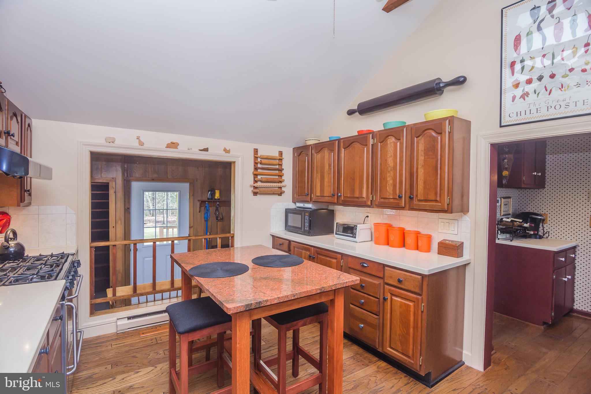 3387 Allen Road Eden, MD 21822 - Photo 24 of 67 a view of a kitchen area with furniture and wooden floor